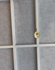 MINI SMIRKY FACE CHARM 14k gold vermeil