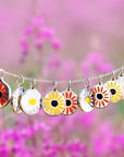 MINI DAISY CHARM sterling silver with rhodium plate